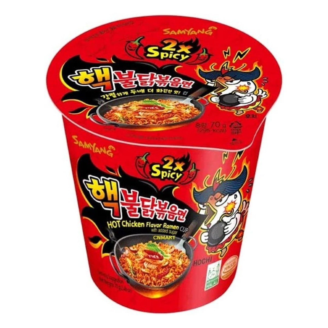 Samyang Buldak 2x Spicy Hot Chicken Flavour Ramen Cup 70g Korean instant noodle cup with extra spicy chilli chicken flavour in red packaging.
