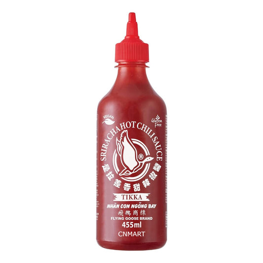 Flying Goose Sriracha Hot Tikka Sauce 455ml in a red plastic squeeze bottle with screw cap, vegan and gluten free labelling, shown on a white background