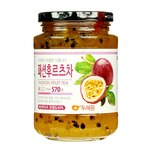 Dooraeone Traditional Korean Passion Fruit Tea Preserve 570g glass jar with visible fruit pulp and seeds on white background