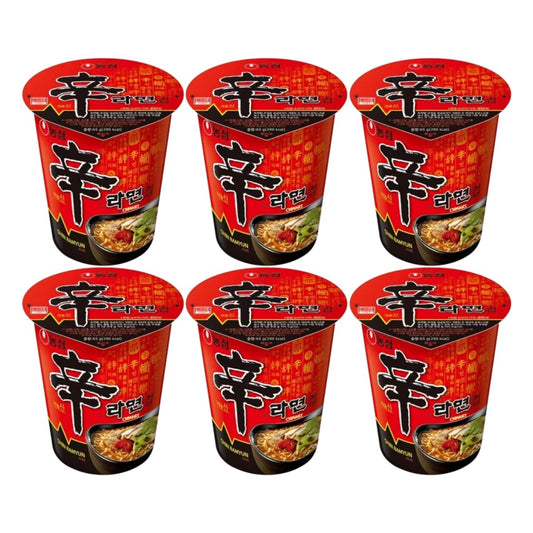 Six Nongshim Shin Cup spicy instant noodle cups arranged in two rows, showing the red packaging with bold black Shin logo and ramen bowl image.