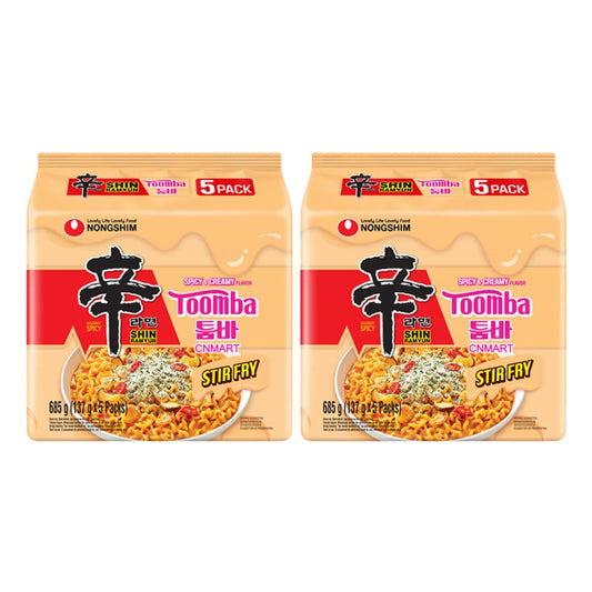 Two packs of Nongshim Shin Ramyun Toomba Stir Fry 5-pack noodles in beige packaging with spicy creamy flavour branding.