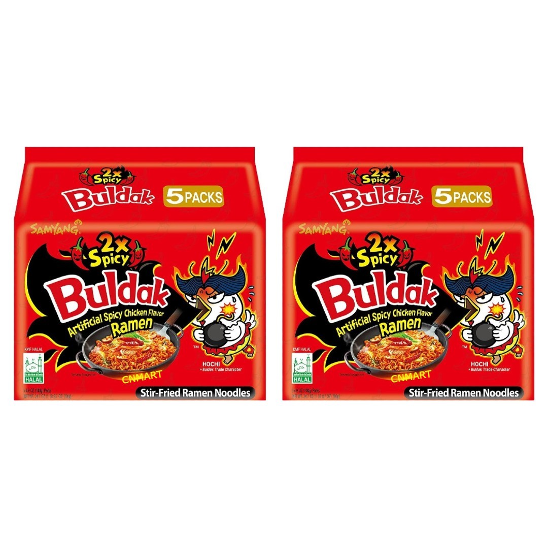 Two packs of Samyang Buldak 2x Spicy Hot Chicken Flavour Ramen 5 pack packaging, showing stir fried ramen noodles with halal certification and the Buldak chicken character on red packaging